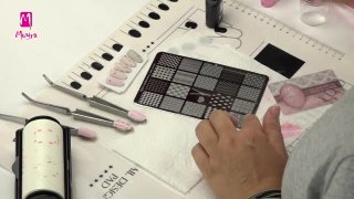 Glittering stamping nail art with diamond motives