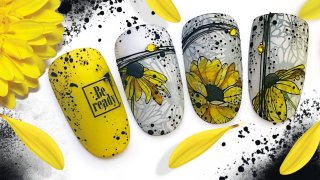 Floral manicure in vivid yellow colour