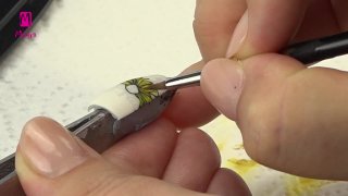 Floral manicure in vivid yellow colour
