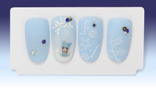Winter nail art with stickers, painting, stamping