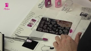 Flower stamping nail art with inscription