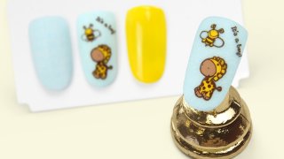 Charming baby shower manicure with stamping motif