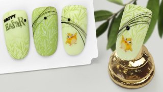 Easter nail art with sticker and gradient stamping