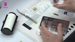 Easter nail decoration with stamping and sticker