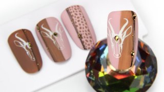 Safari-like nail art with animal motif