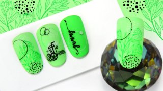 Vivid, fresh, green nail art with cheerful motifs