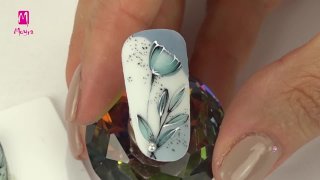 Spring nail art with blue flowers and bead - Preview
