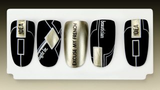 Black-gold geometric nail art with stamping