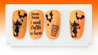 Manicure with charming witch and bat for Halloween