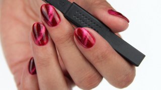 Burgundy red manicure with magnetic gel polish