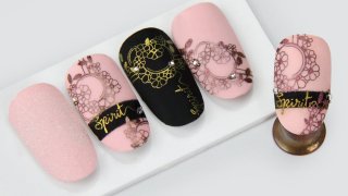 Effected floral and inscripted stamping nail art