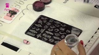 Effected floral and inscripted stamping nail art