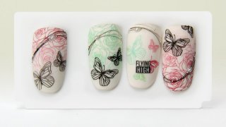 Butterfly nail art on a gradient background motif
