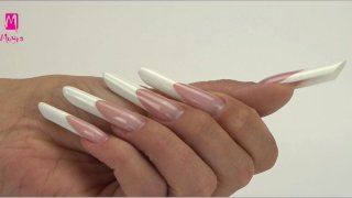 Classic white pipe-shaped nail with filed smile line built with Moyra builder gels