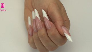 Classic white gothic almond-shaped French nail with filed smile line