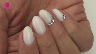 Wonderful, opalescent white gel polish salon nails - Preview