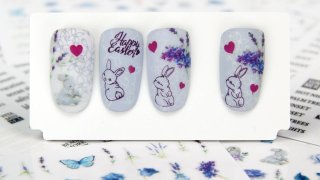 Easter nail art with stamped bunny and stickers