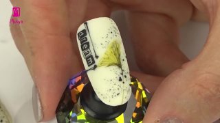 Spring nail art with aquarelle flower and stamping - Preview