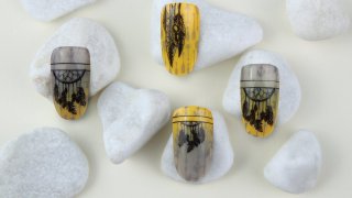Layered stamping nail art with masking sticker