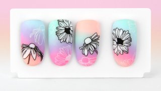 Floral stamping nail art on a colourful ombre base