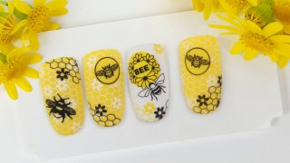 Layered stamping nail art with bees