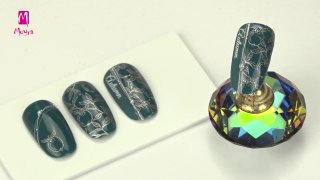 Nail art with chrome silver, stamped apple motif - Preview