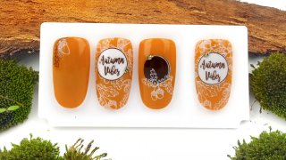 Autumn stamping nail art with geometric shape