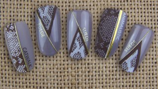 Snakeskin stamping with geometric shape, gold text