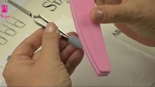 Stamped pattern effected with different nail foils