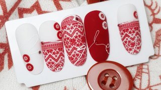 Vivid red winter nail art with sweater design