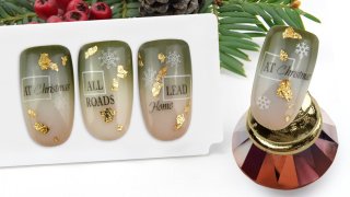 Christmas nail art on a nail foiled background