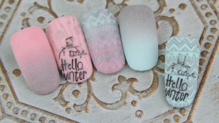 Norka's winter nail art on a sweater design base