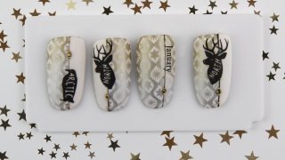 Winter stamping nail art with deer on ombre base