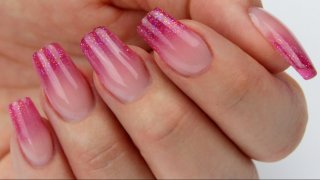 Square-shaped, ombre nail in salon length with colourful, glittering nail end
