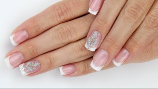 Square-shaped French nail in salon length with wiped smile line and white free edge