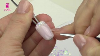 Floral nail art on glitter ombre base