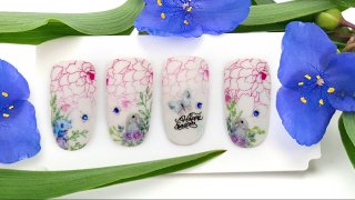 Colourful floral nail art with Easter bunny