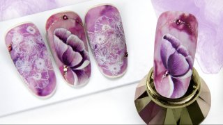 Purple cup-shaped flower on a marble base