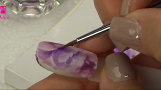Purple cup-shaped flower on a marble base