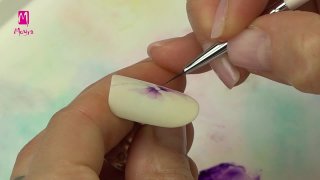 Aquarelle nail art with purple flower and beads