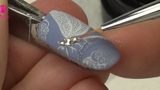 Jewelry-like stamping nail art with dragonfly