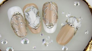 Hand-painted nail art with stained glass look