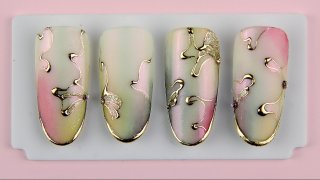 Hand-painted waves effected with shiny nail foil