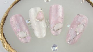 Delicately shimmering, marble nail art with beads