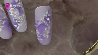 Floral nail art with bead and purple marble paint - Preview