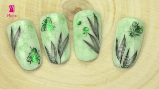 Stamping pattern effected with green nail foil - Preview