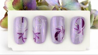 Purple stamping nail art on diamond shine base