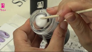 Purple stamping nail art on diamond shine base
