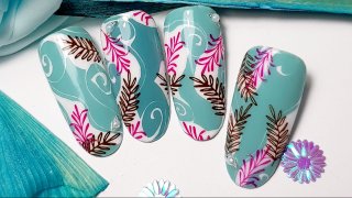 Hand-painted nail art with stamped leaves