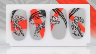 Stylish, matte nail art with tiger motif